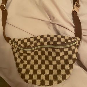 FREE PEOPLE BELT BAG!! Never used!! Lots of space and has an adjustable band!